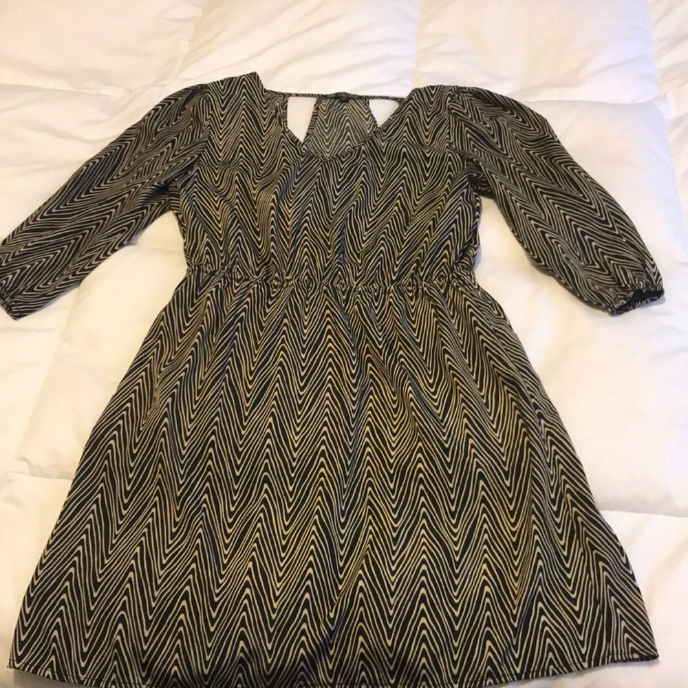 3/4 length patterned dress.